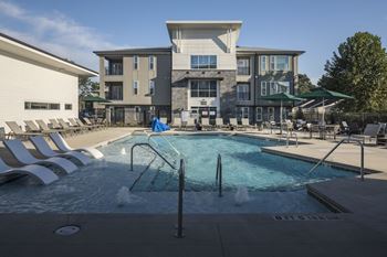 Swimming pool with relaxing chairs